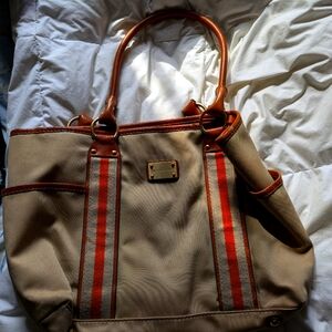 Tan with orange Michael Kors handbag
